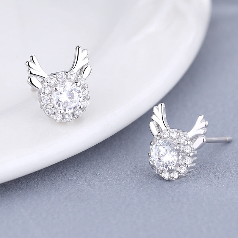 Women's earrings with sparkling crystals and playfully designed wings All Fashion