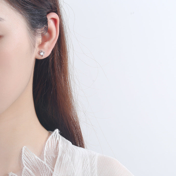 Women’s stud earrings with stylish heart design and sparkling crystals All Fashion