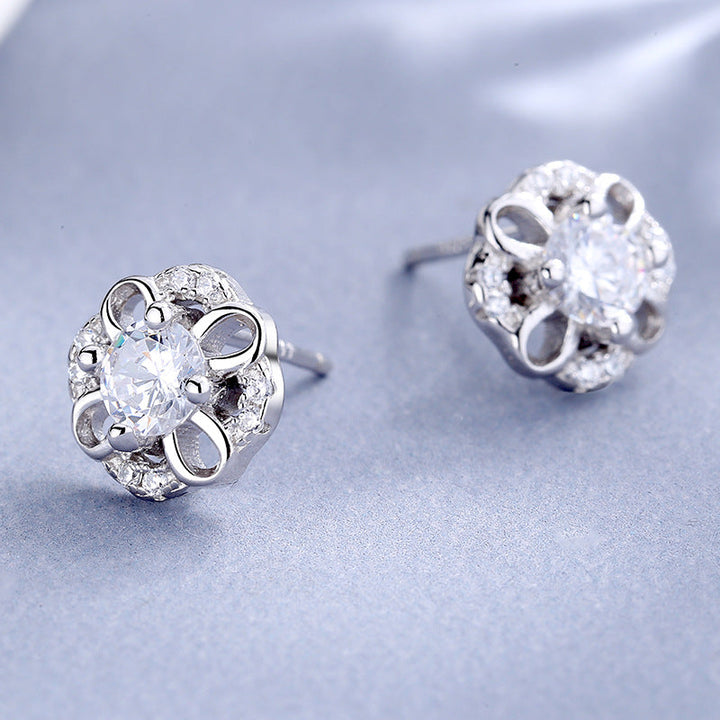 Women's stud earrings with delicate flower design and sparkling crystals All Fashion