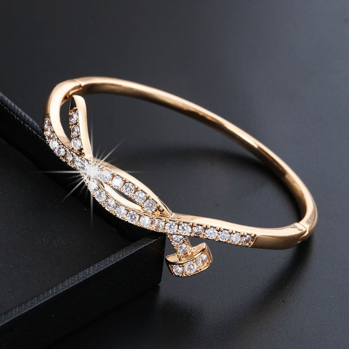 Ladies bracelet with elaborate infinity symbol and sparkling zirconia All Fashion
