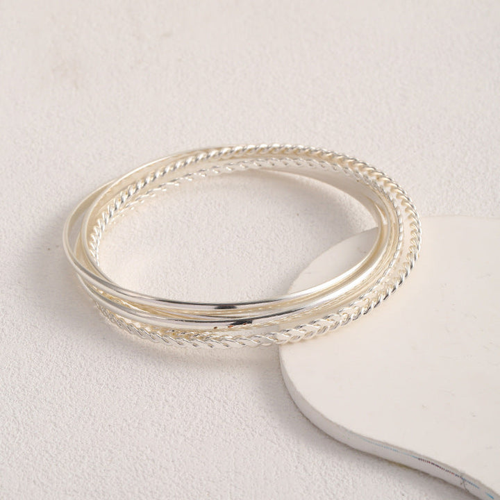 Women's bangle set with elaborate, braided and simple designs All Fashion