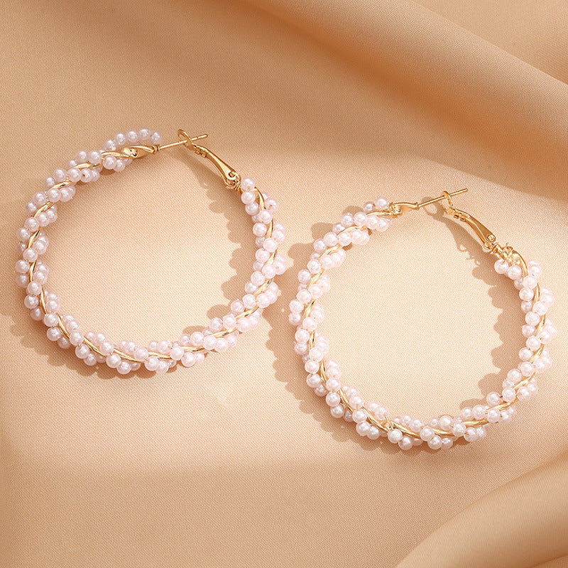 Ladies hoop earrings with luxurious pearl accents and elegant, twisted design All Fashion