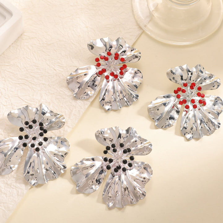 Women’s metal flower earrings with sparkling red accents All Fashion