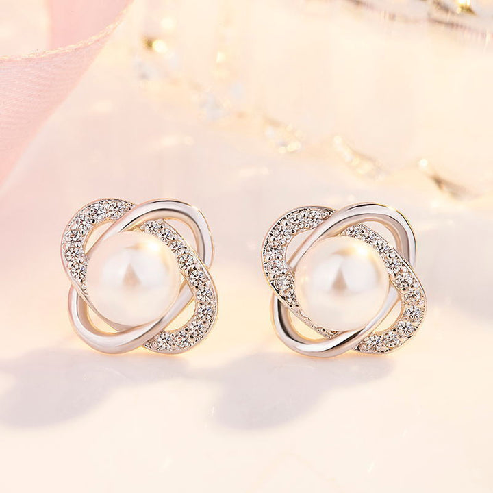 Ladies earrings with artistic pearl design and sparkling zirconia All Fashion
