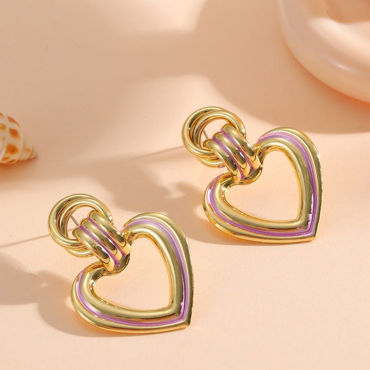 Women’s earrings in modern heart design All Fashion