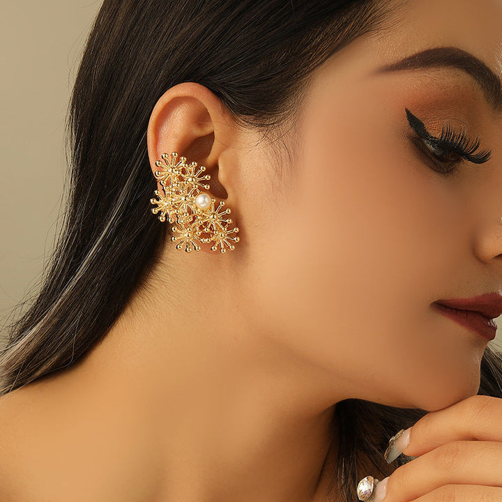 Women’s ear clips with elaborate flower design and pearl accent All Fashion