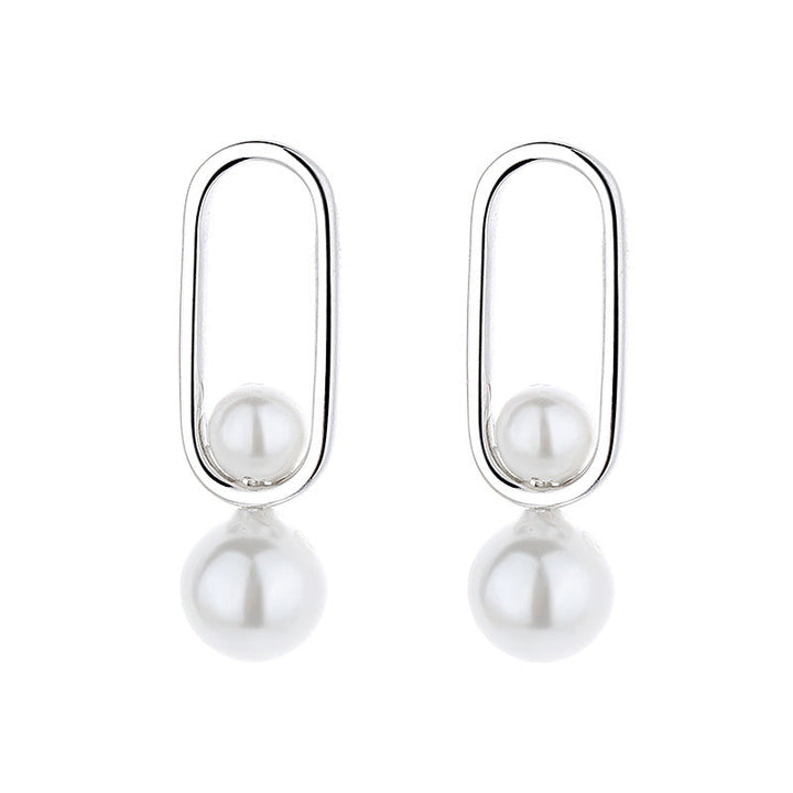 Women's stud earrings with modern oval design and elegant pearls All Fashion