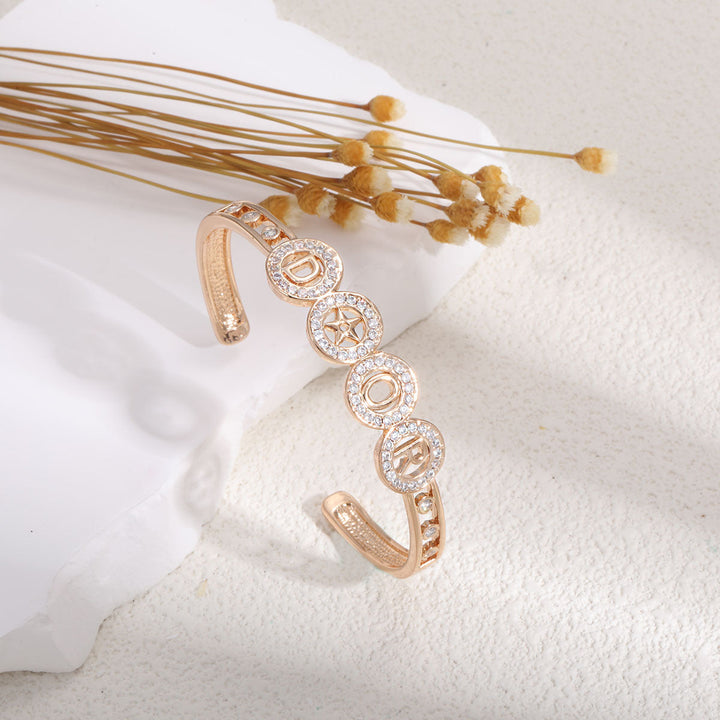 Ladies bracelet with elaborate infinity symbol and sparkling zirconia All Fashion