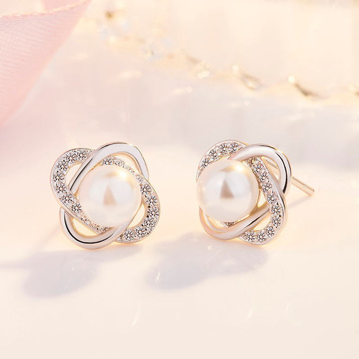 Ladies earrings with artistic pearl design and sparkling zirconia All Fashion