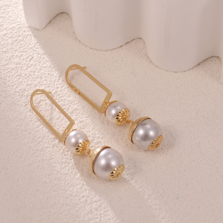 Ladies earrings with elegant pearl design All Fashion