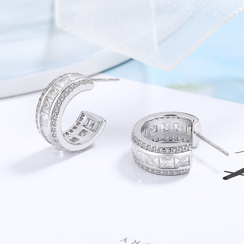 Women's stud earrings with elegant crystal and zirconia embellishment All Fashion