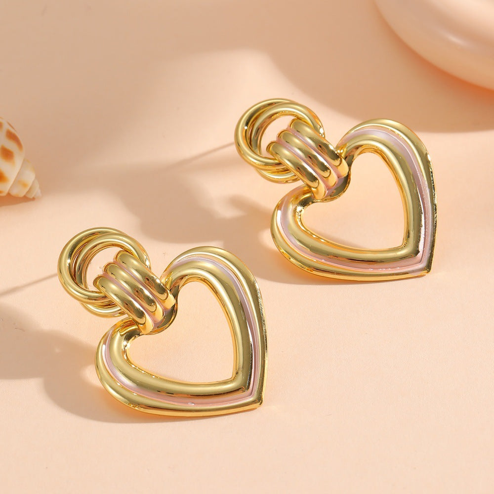 Women’s earrings in modern heart design All Fashion