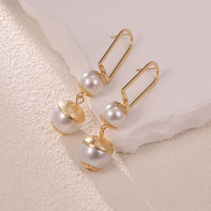 Ladies earrings with elegant pearl design All Fashion