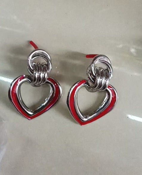Women’s earrings in modern heart design All Fashion