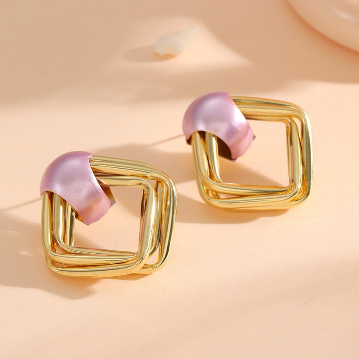 Women modern earrings with asymmetrical design All Fashion