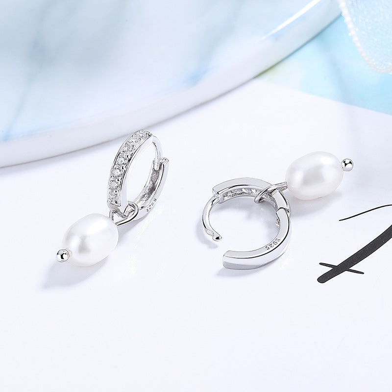 Ladies earrings with elegant zirconia decorations and pearl pendants All Fashion