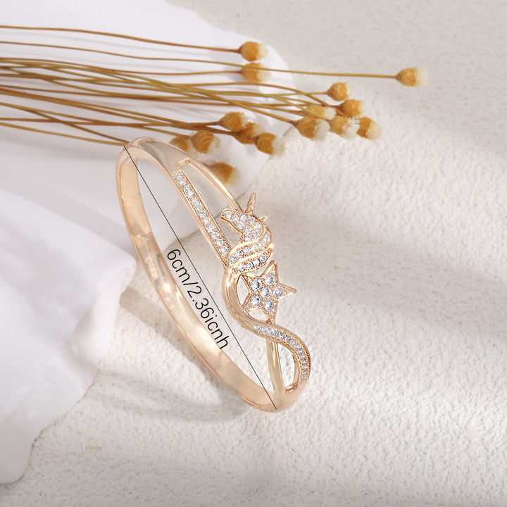 Ladies bracelet with elaborate infinity symbol and sparkling zirconia All Fashion