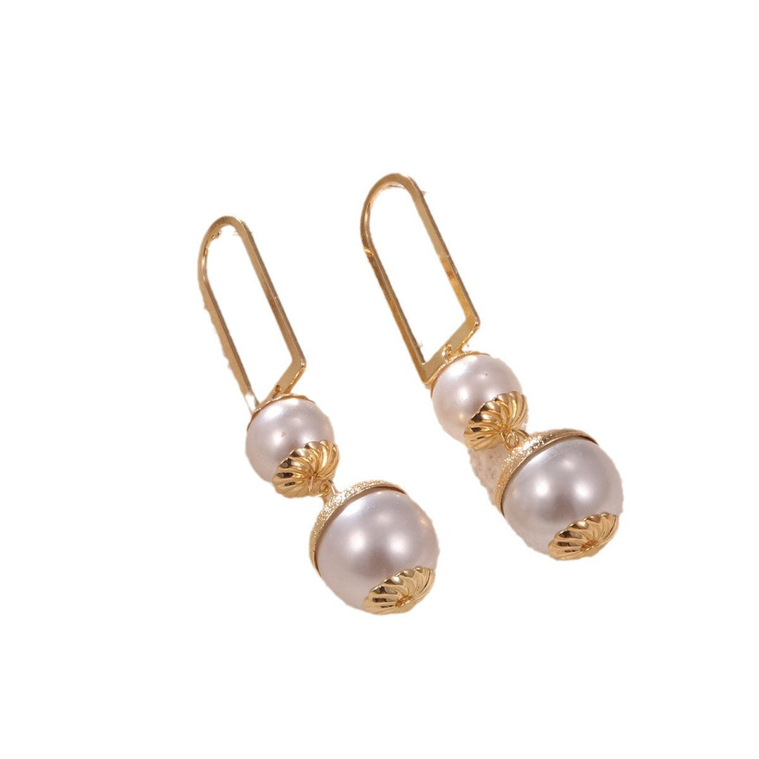 Ladies earrings with elegant pearl design All Fashion