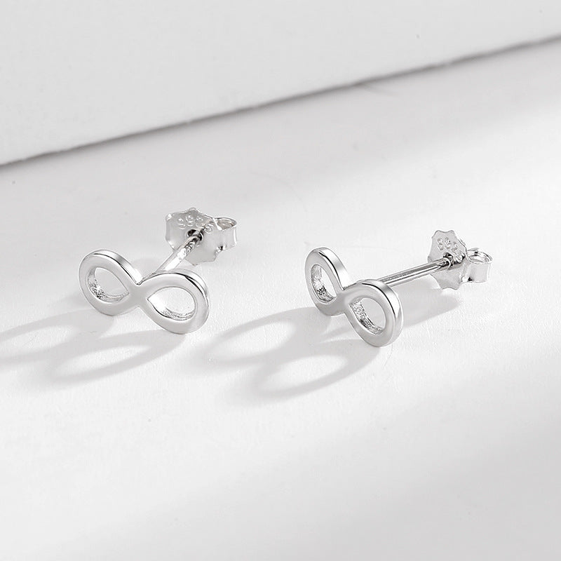 Ladies earrings in infinity design made of high-quality material All Fashion