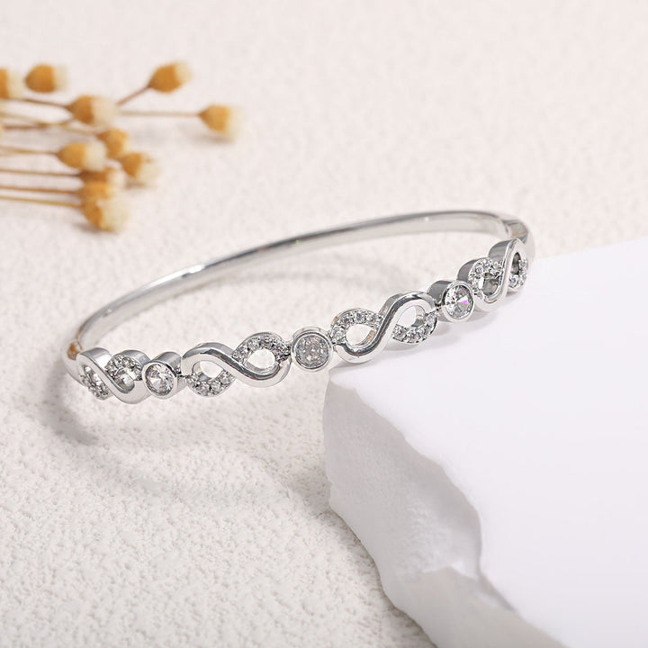 Ladies bracelet with elaborate infinity symbol and sparkling zirconia All Fashion