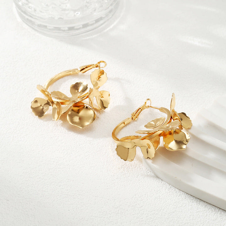 Ladies Creoles with artistic floral ornament All Fashion