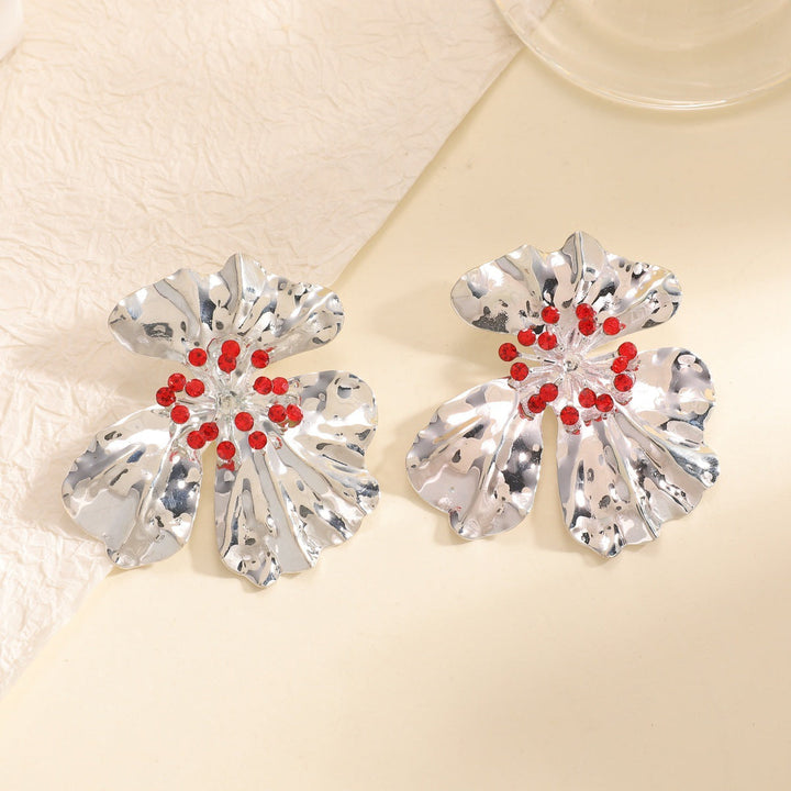 Women’s metal flower earrings with sparkling red accents All Fashion