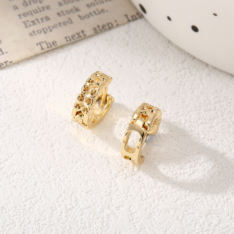 Women's hoop earrings with modern, textured design All Fashion