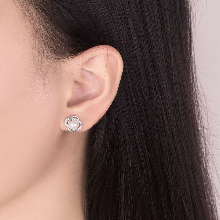 Ladies earrings with artistic pearl design and sparkling zirconia All Fashion