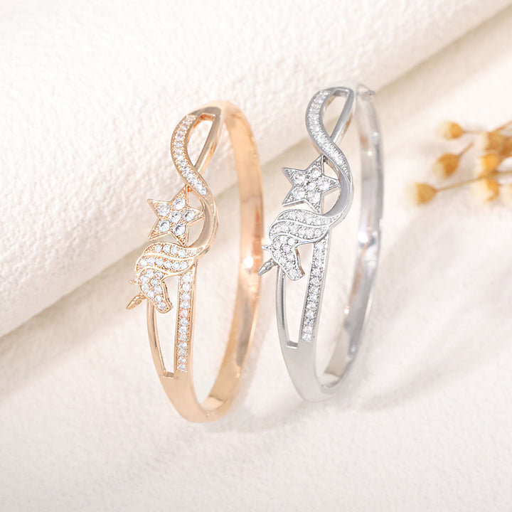 Women's bangle with elegant infinity pattern and sparkling zirconia All Fashion
