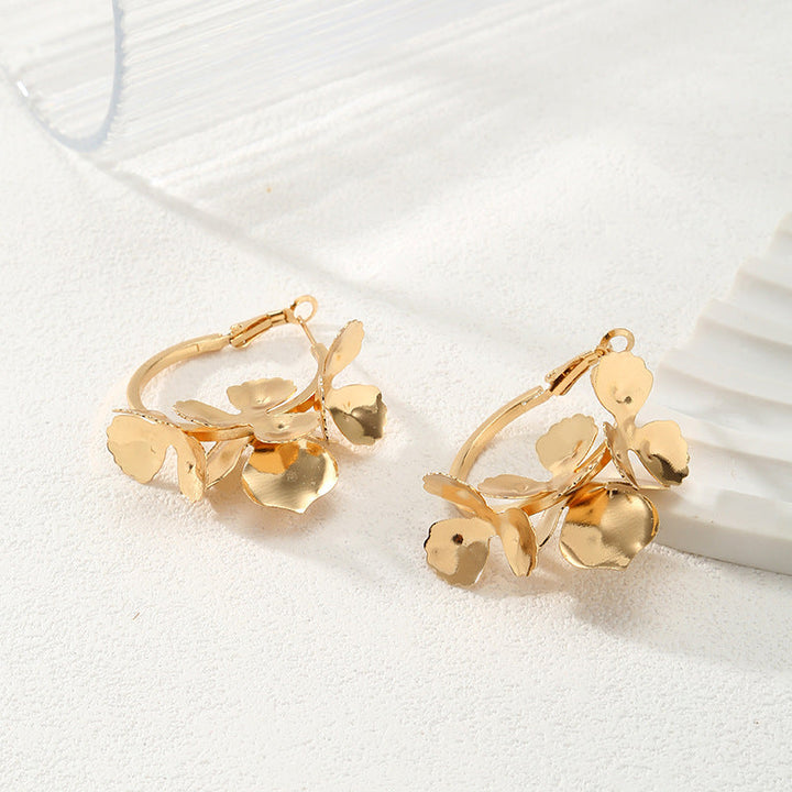 Ladies Creoles with artistic floral ornament All Fashion