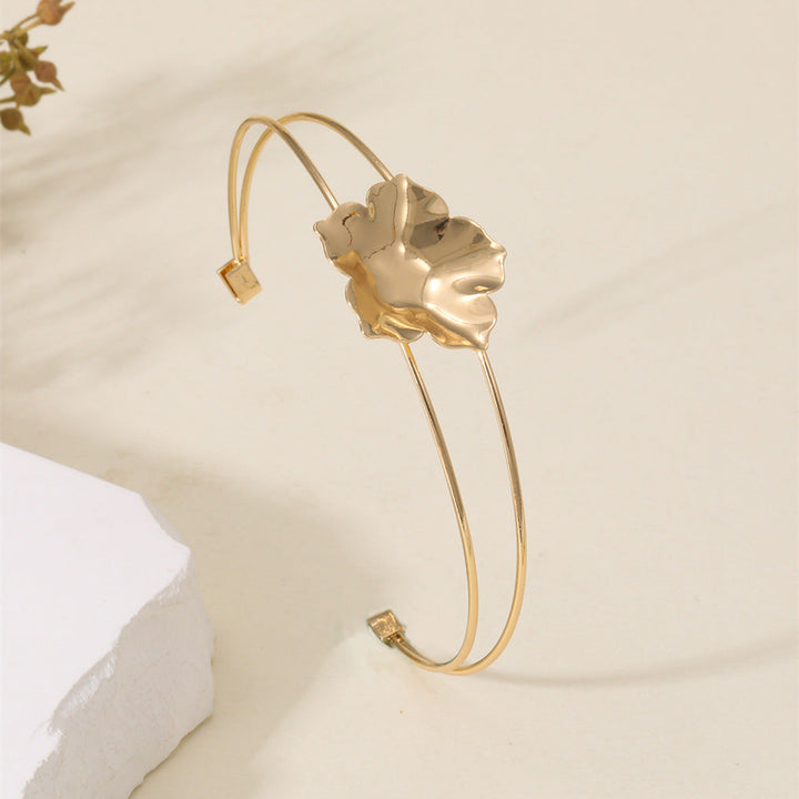 Women's cuff bracelet with artistic leaf motif All Fashion