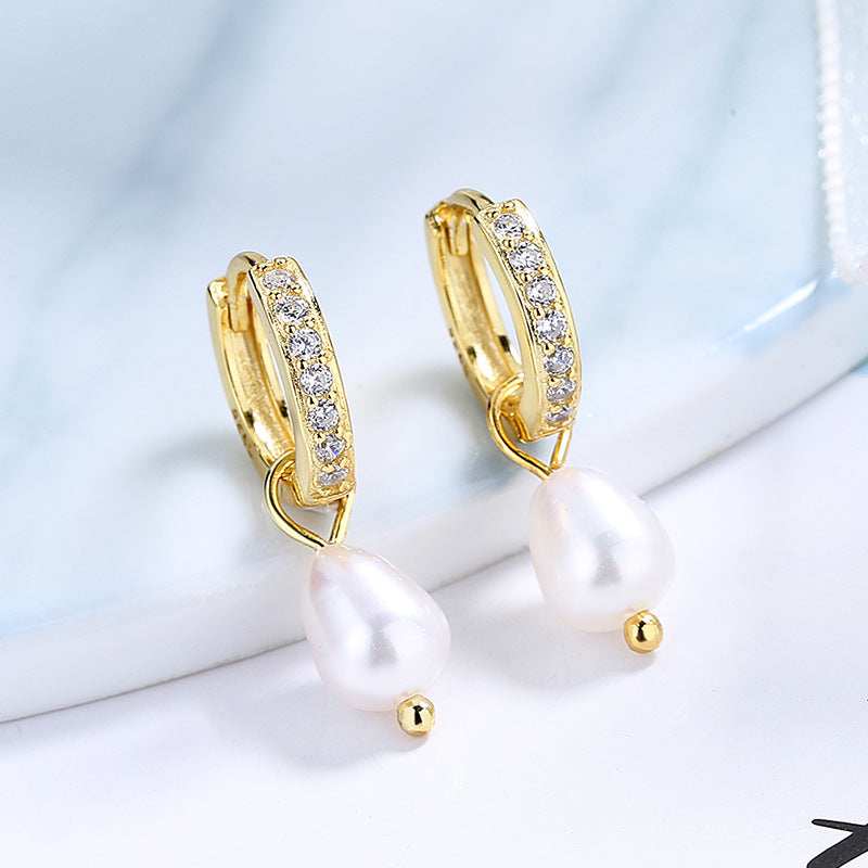 Ladies earrings with elegant zirconia decorations and pearl pendants All Fashion
