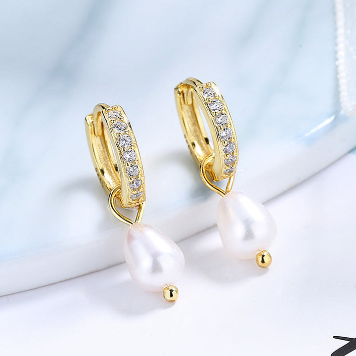 Ladies earrings with elegant zirconia decorations and pearl pendants All Fashion