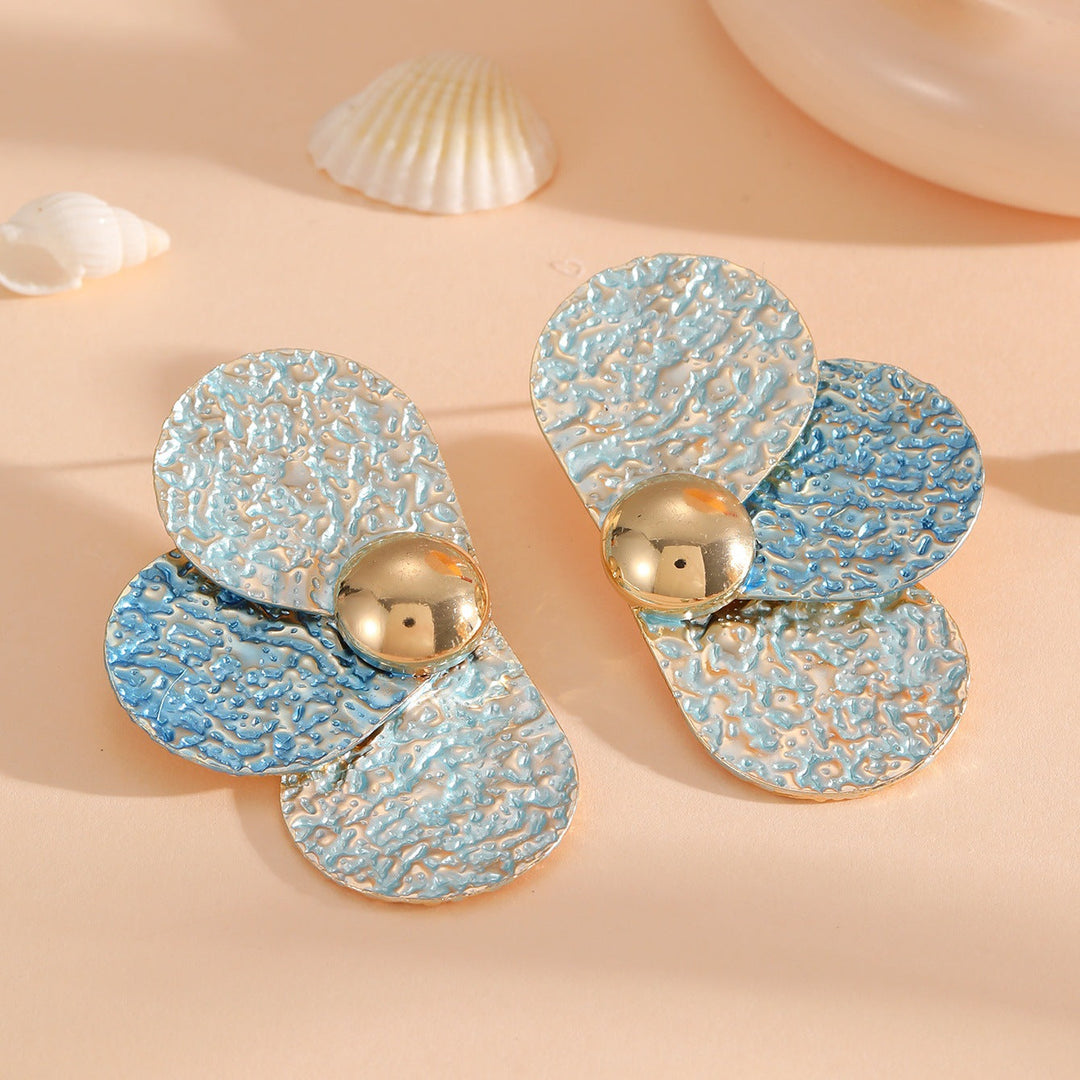 Women's ear clips in elaborate floral pattern All Fashion