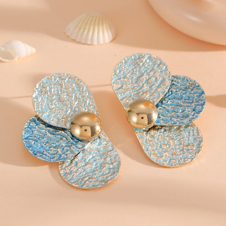 Women's ear clips in elaborate floral pattern All Fashion
