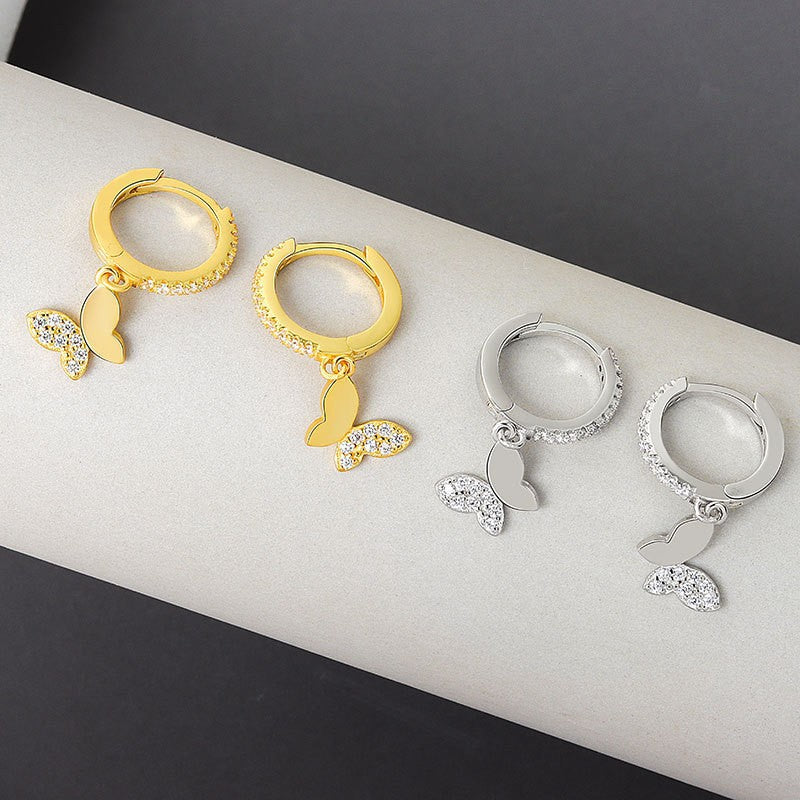Ladies earrings with elegant butterfly design and sparkling details All Fashion