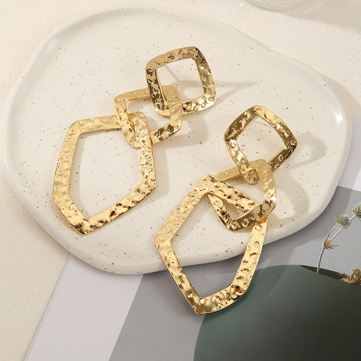 Women's elegant earrings with rustic, folded design All Fashion