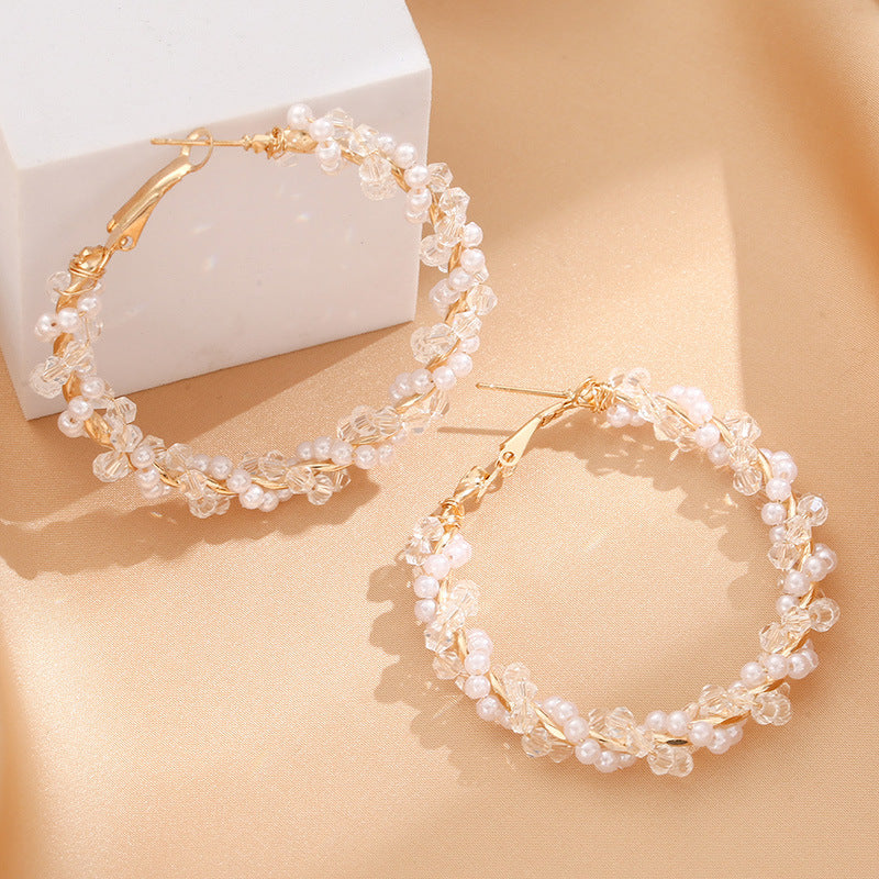 Ladies hoop earrings with luxurious pearl accents and elegant, twisted design All Fashion