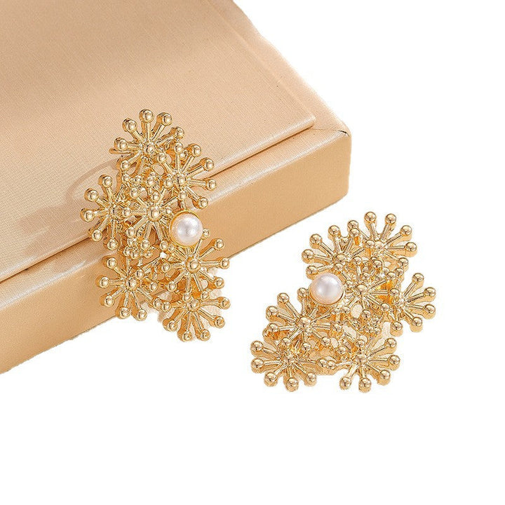 Women’s ear clips with elaborate flower design and pearl accent All Fashion