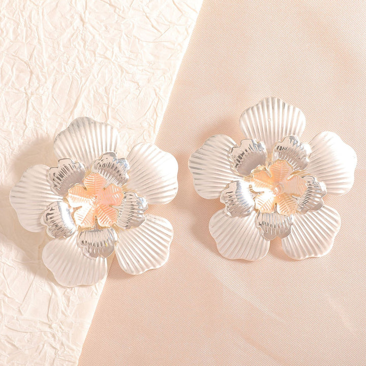 Ladies' flower earrings with intricate design and glossy accents All Fashion