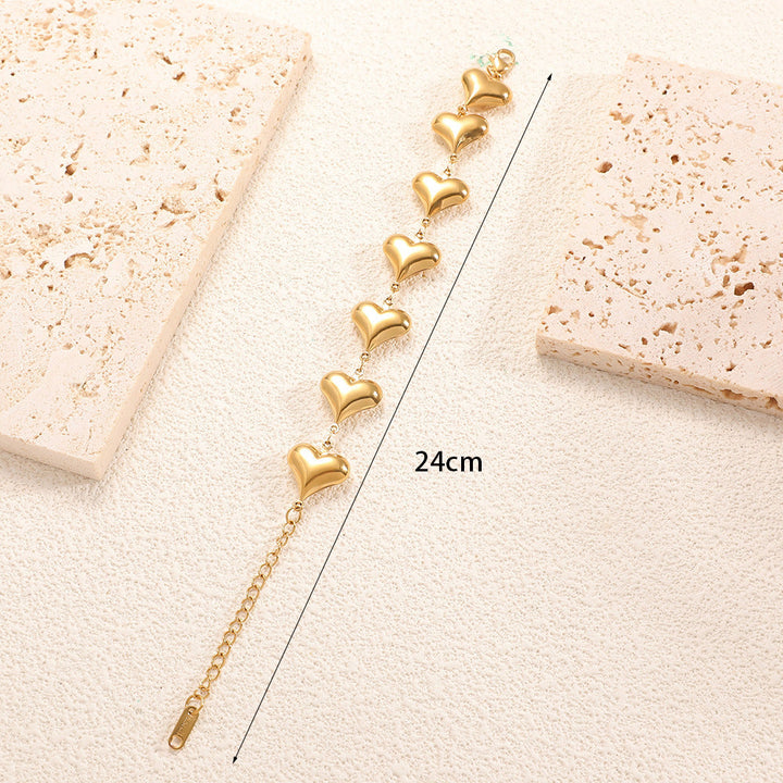 Ladies' bracelet with elegant heart design and fine link chain All Fashion