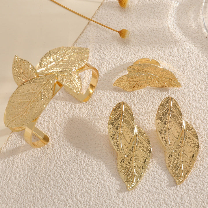 Ladies' bangle with artistic leaf design All Fashion