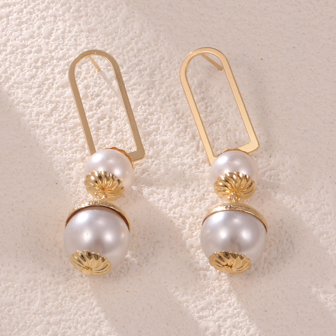 Ladies earrings with elegant pearl design All Fashion