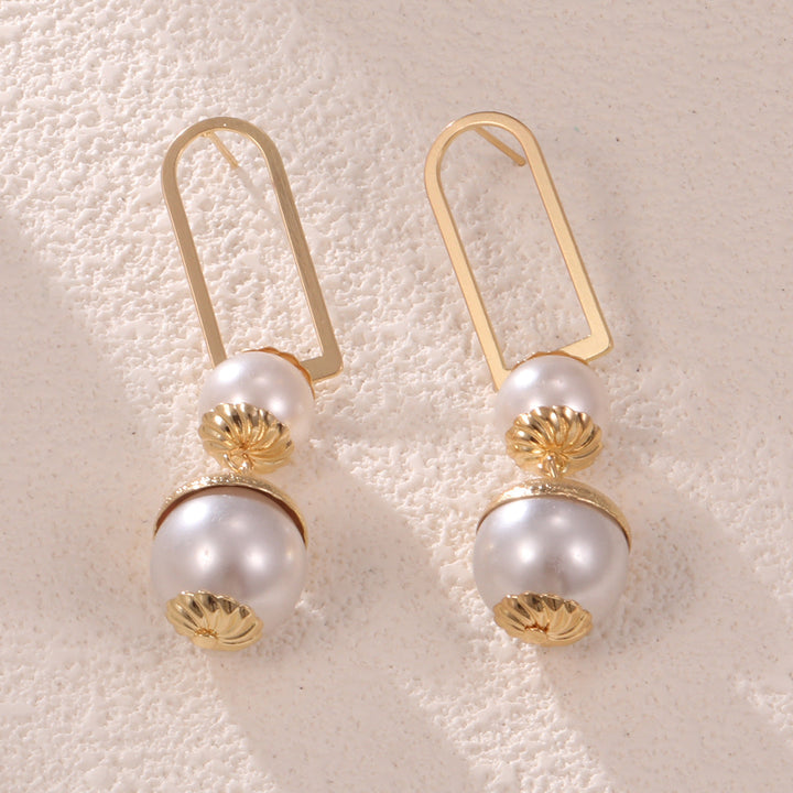 Ladies earrings with elegant pearl design All Fashion