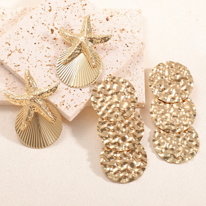 Women's ear clips in luxurious shell and starfish design All Fashion