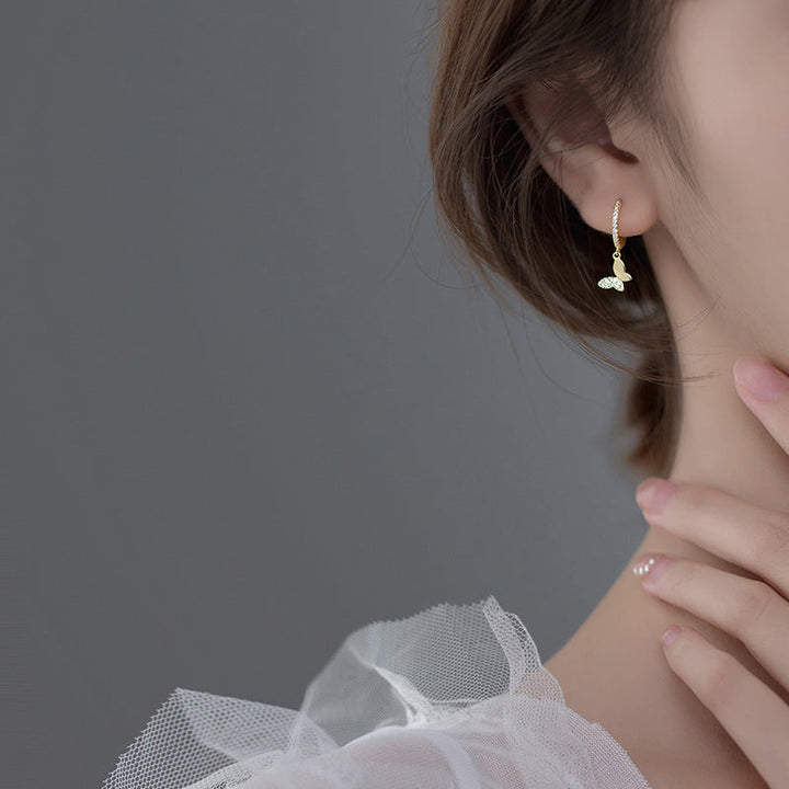 Ladies earrings with elegant butterfly design and sparkling details All Fashion