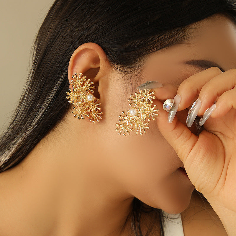 Women’s ear clips with elaborate flower design and pearl accent All Fashion