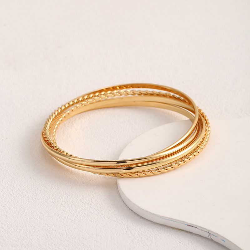 Women's bangle set with elaborate, braided and simple designs All Fashion