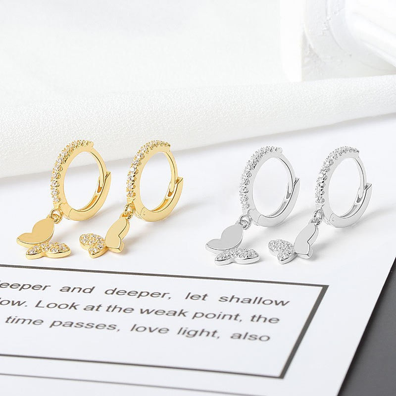 Ladies earrings with elegant butterfly design and sparkling details All Fashion