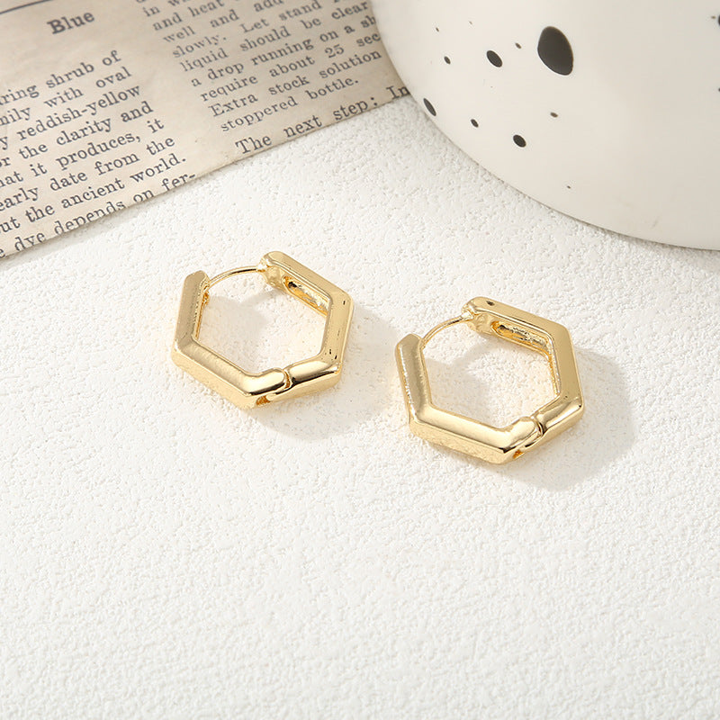 Women's hoop earrings with modern, textured design All Fashion
